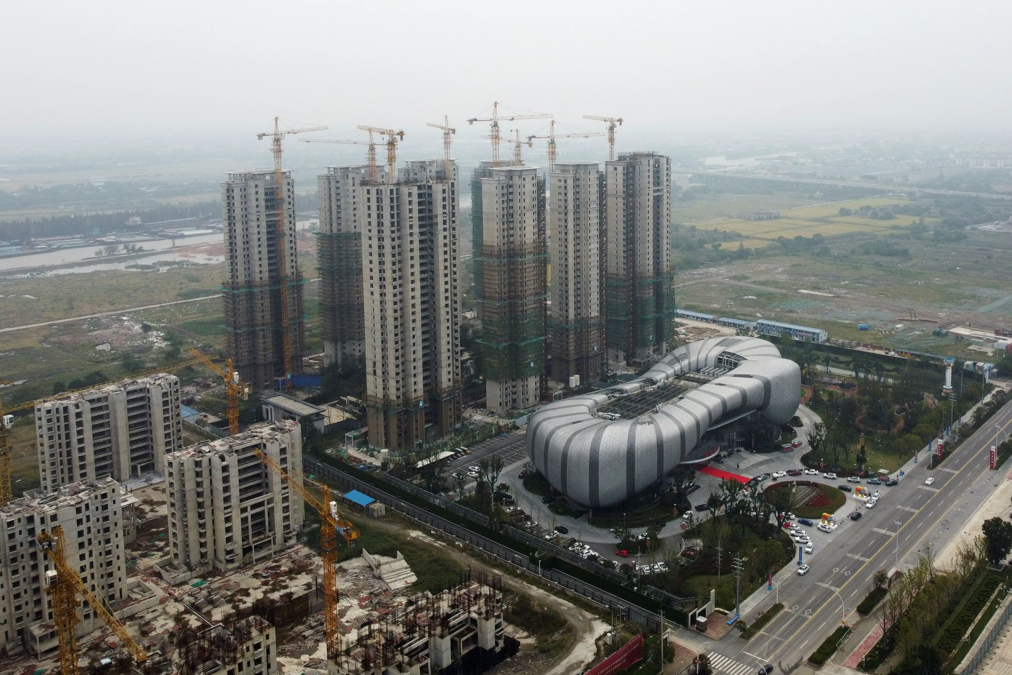 Evergrande resumed work on several projects after averting bankruptcy