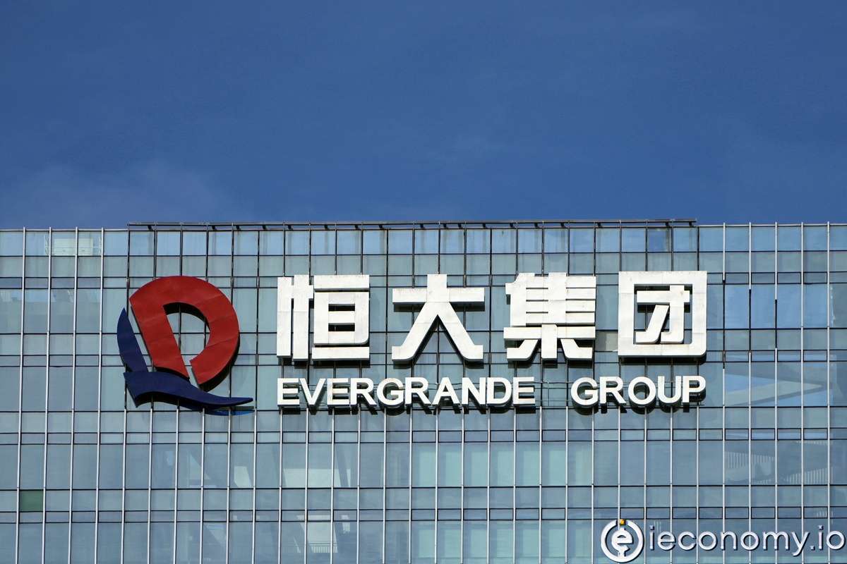 Evergrande Group warns of default again