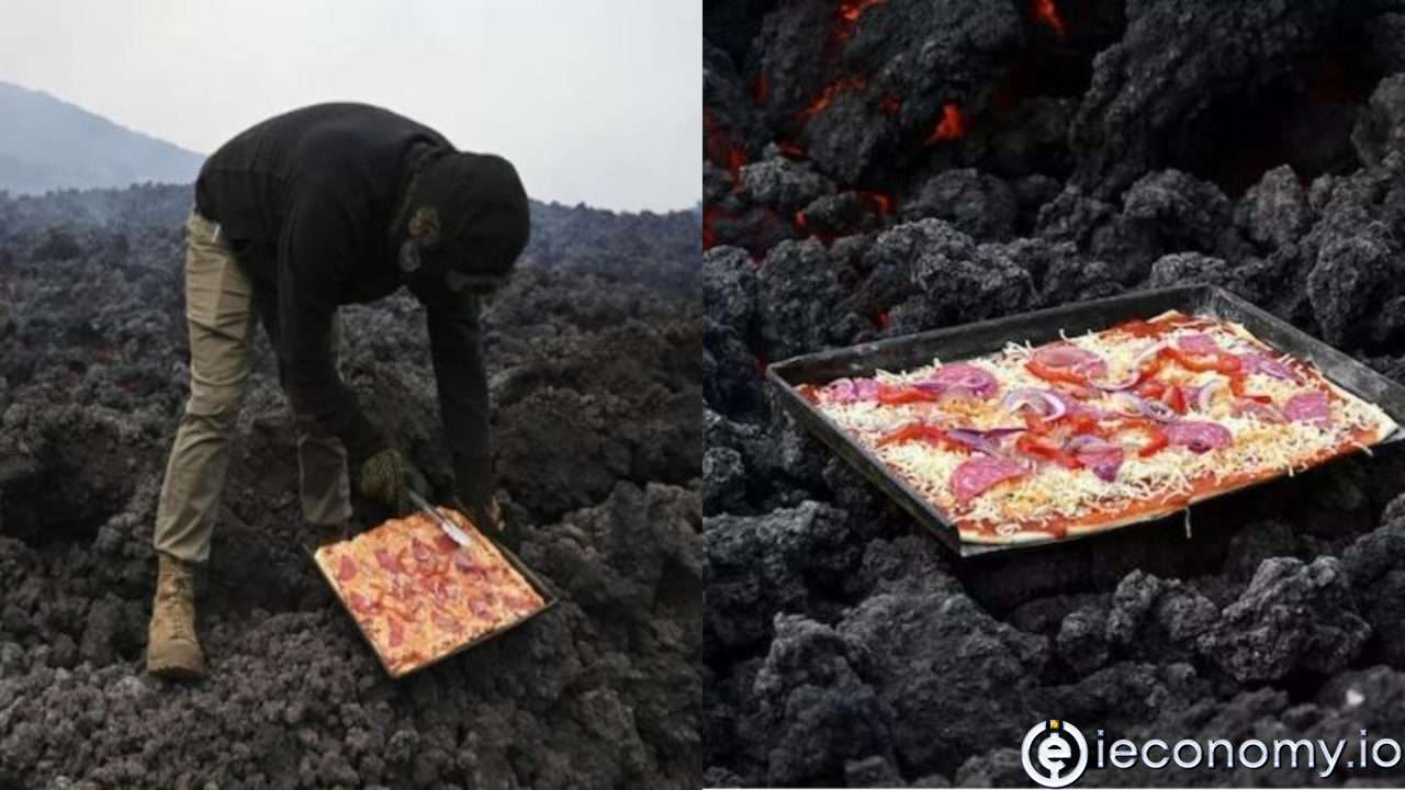 Bir işadamı sıcak lavda pişmiş taze pizza sunuyor